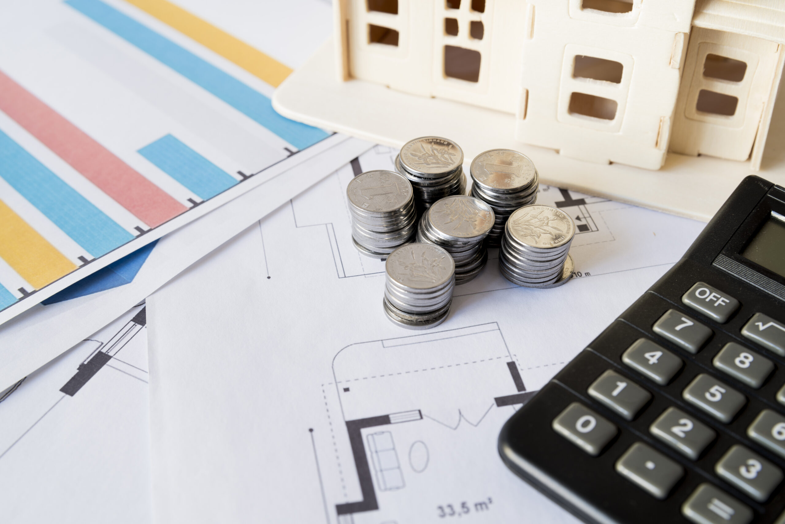 graph stack coins calculator house model blueprint scaled