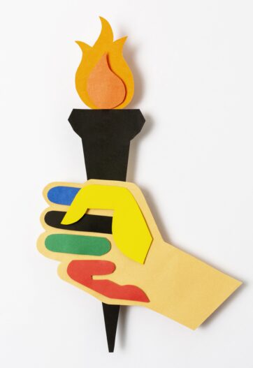 paper hand holding torch